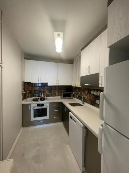 The New Cozy Apartment Atakoy - image 11